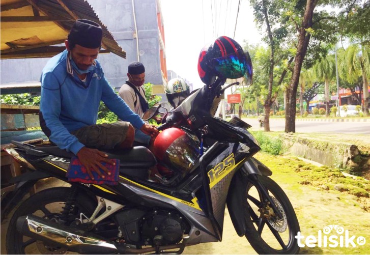 Landaru, driver ojek pangkalan di Jalan Made Sabara. Foto: Dul/Telisik