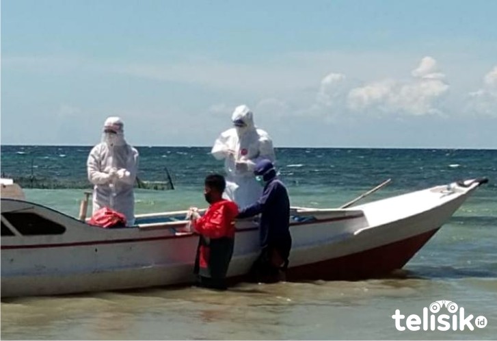 Penjemputan OTG oleh Tim Satgas COVID-19 Bombana. Foto: Hir/Telisik