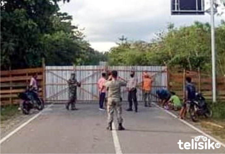 Foto yang menampakkan penutupan perbatasan antara Konawe dan Konut. Foto: Kardin/Telisik