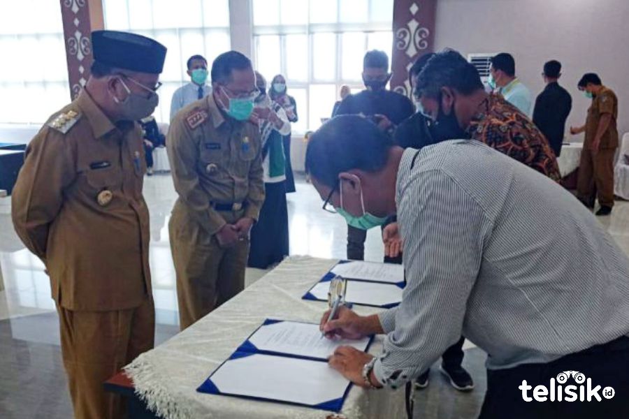 Penandatangan MoU antara Pemda Konsel dam KPw BI Sultra. Foto: Ist.