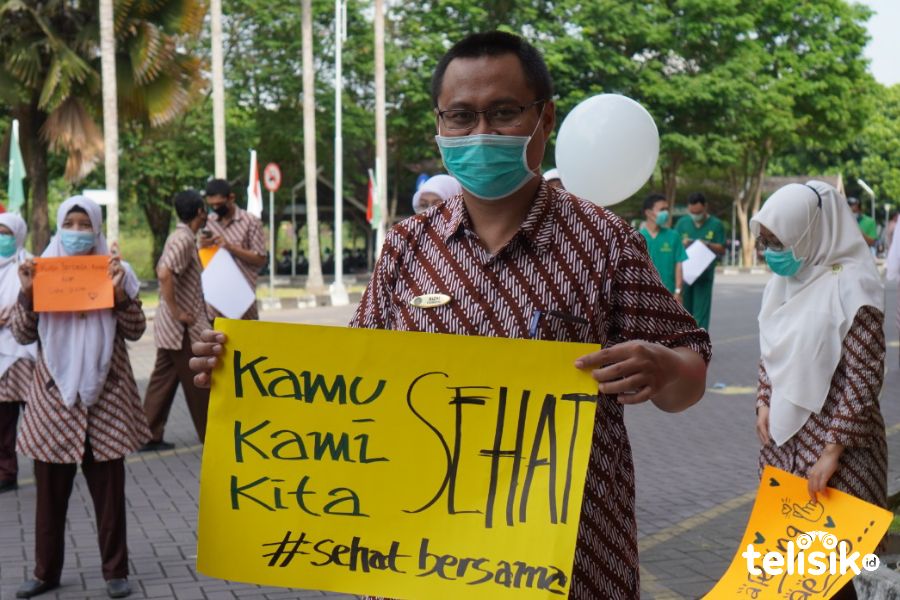 Penyambutan kembalinya tenaga kesehatan RS PKU Muhammadiyah Gamping yang sembuh dari COVID-19. Foto: Affan Safani Adham/Telisik