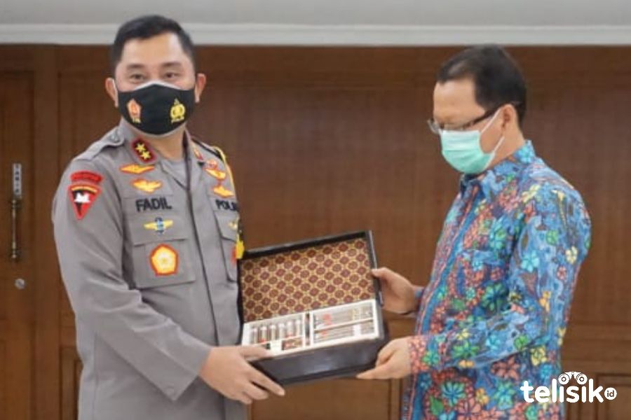 Kapolda Jatim dan Dirut PTPN X di Mapolda Jatim. Foto: Try wahyudi/Telisik