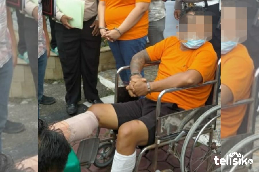 Kamiso, pelaku penembakan saat dihadirkan di halaman Polrestabes Medan. Foto: Ones Lawolo/Telisik