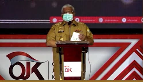 Gubernur Sultra, Ali Mazi saat membuka kegiatan Furum Sinergi Stakeholder dan OJK Fusion. Foto: Ist.
