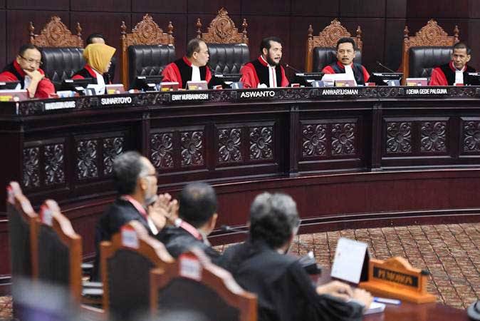 Suasana di ruang sidang MK. Foto: Repro Bisnis.com