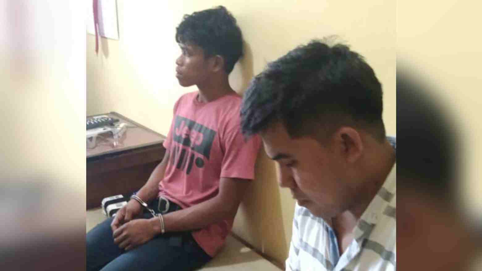 Pelaku FU (kiri) saat diamankan di Polres Buton. Foto: Ist.