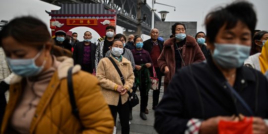 Aktivitas warga China di tengah penemuan virus baru. Foto: Repro AFP