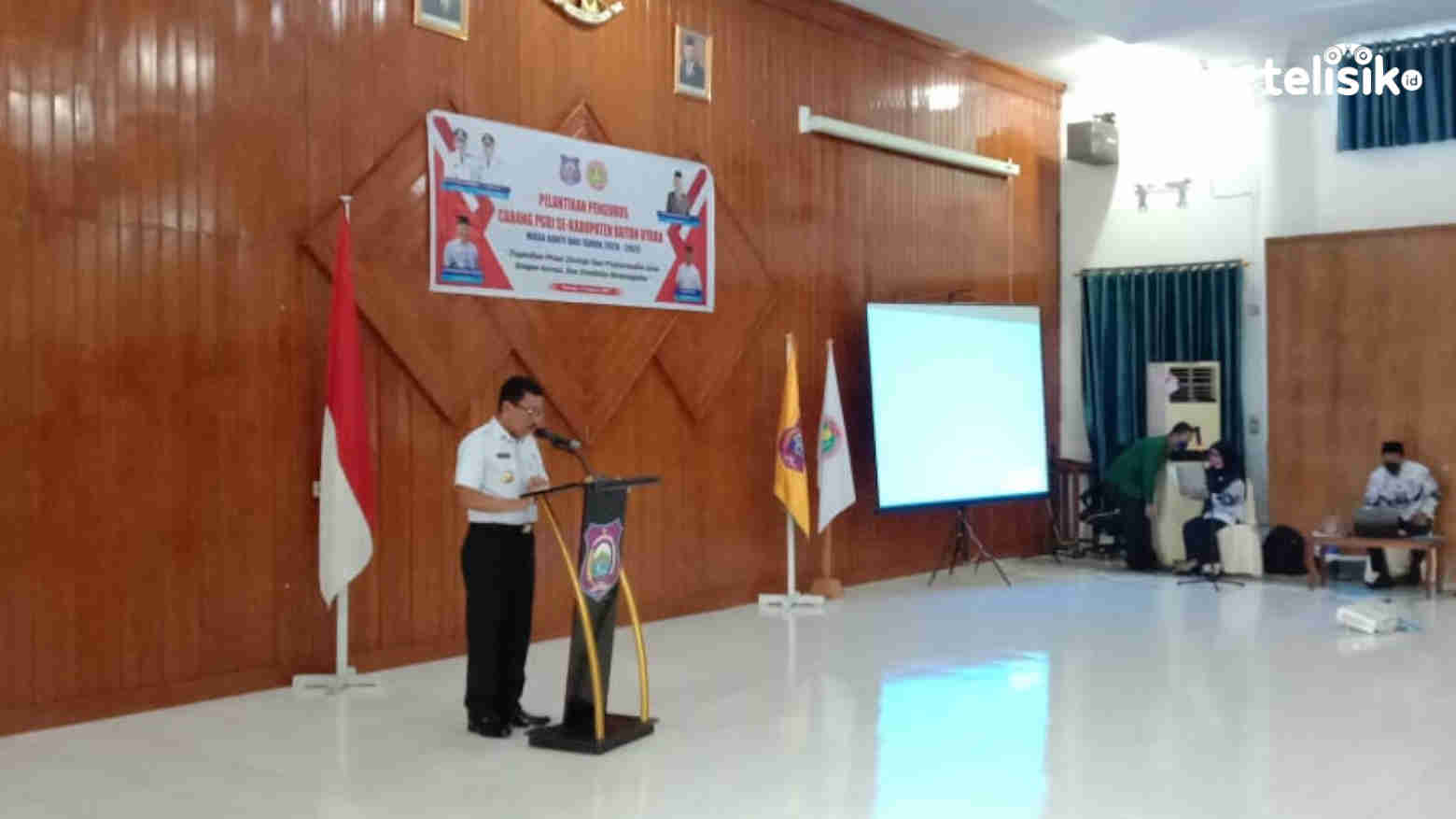 Bupati Buton Utara, Drs. H. Muh. Ridwan Zakariah, M.Si saat membawakan sambutan pada pelantikan PGRI se-Kabupaten Buton Utara. Foto: Aris/Telisik