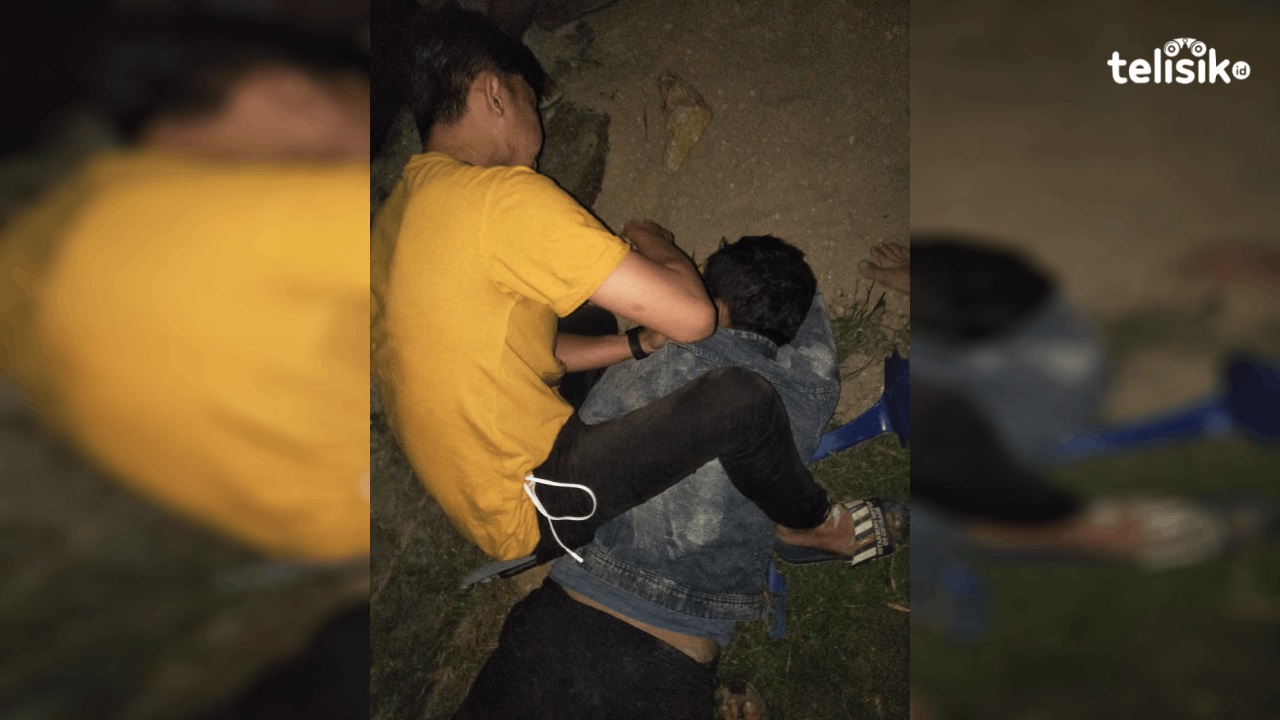 Pelaku saat diamankan warga. Foto: Thamrin Dalby/Telisik
