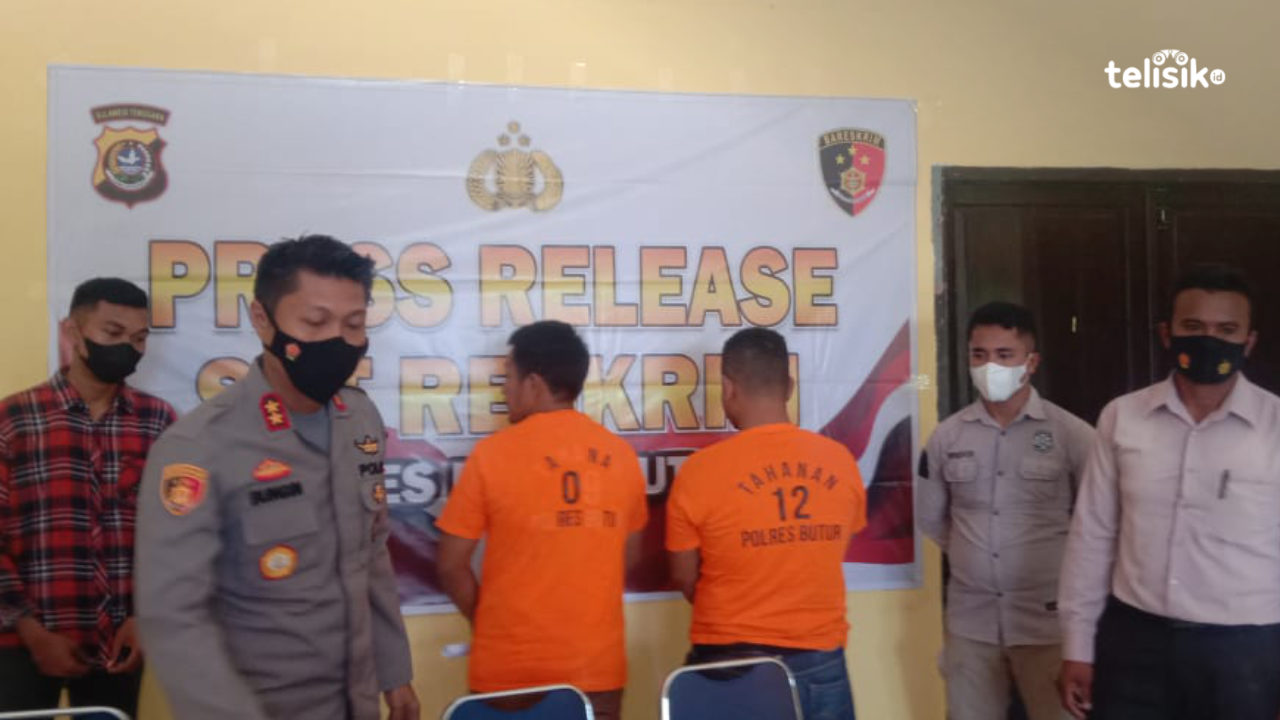 Tersangka Kepala Desa Kasulatombi dan Kaur Keuangan memakai baju tahanan di Polres Buton Utara beberapa waktu lalu. Foto: Aris/Telisik
