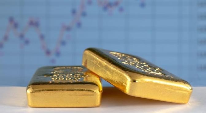 Harga emas Antam hari ini kembali anjlok dibandingkan kemarin. Foto: Repro tirto.id