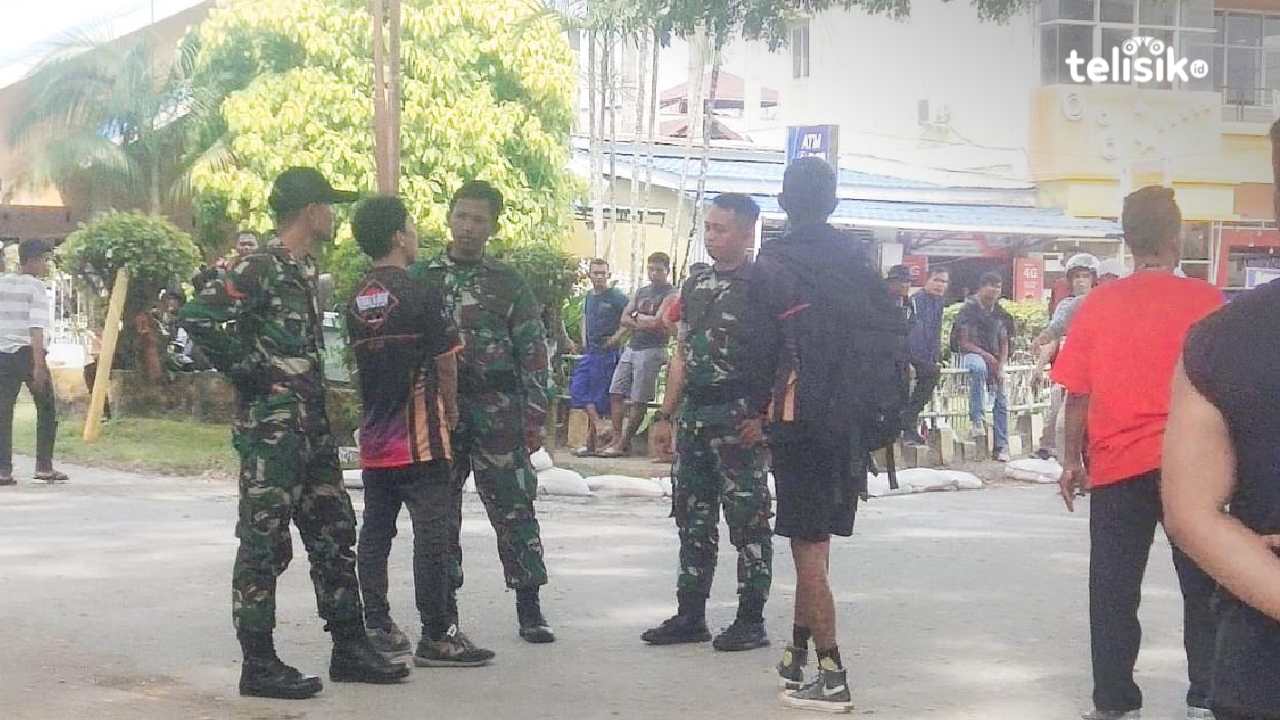 Beberapa anggota TNI AD yang terlibat keributan dengan panitia. Foto: Erni Yanti/Telisik