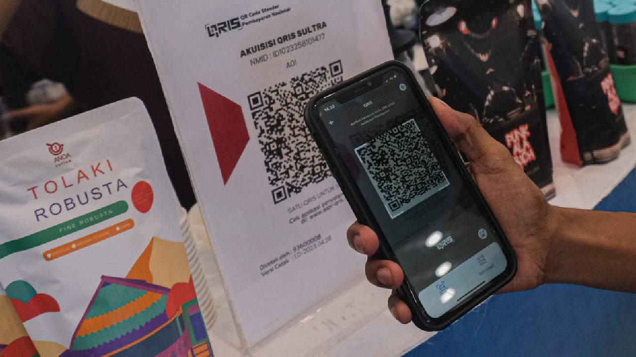 Metode pembayaran menggunakan qris saat ini, marak digunakan. Foto: Repro antaranews.com