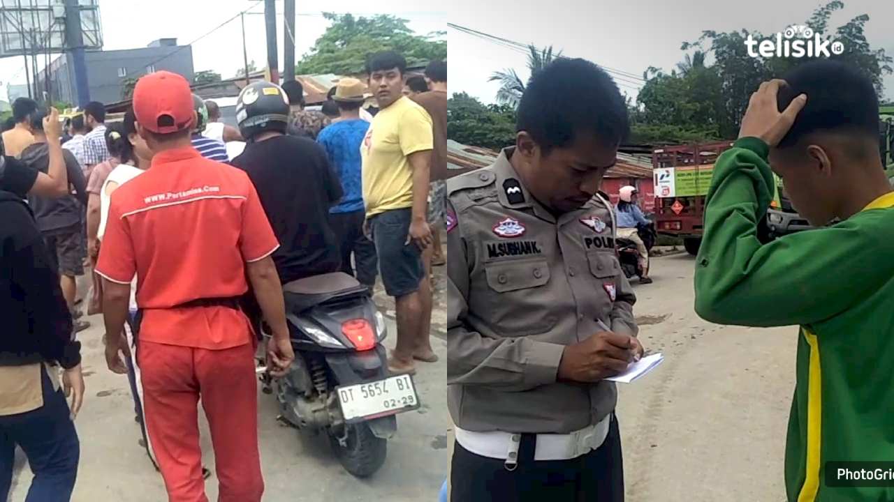 Warga berusaha mengamankan sopir yang hendak dihajar massa dan petugas kepolisian saat meminta keterangan kepada rekan korban. Foto: Thamrin Dhalby/Telisik