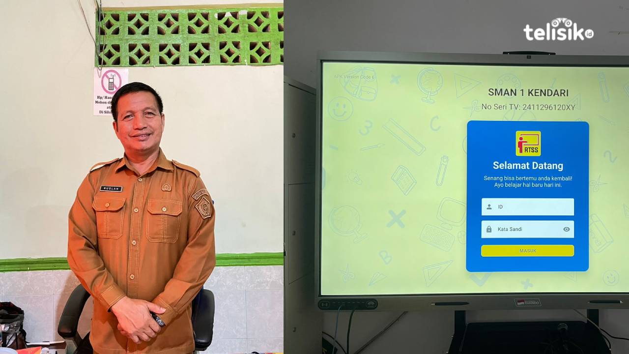Kepala SMAN 1 Kendari, Ruslan saat memperlihatkan fasilitas Smartboard. Foto: Sitti Aisyah Hildaniar/Telisik