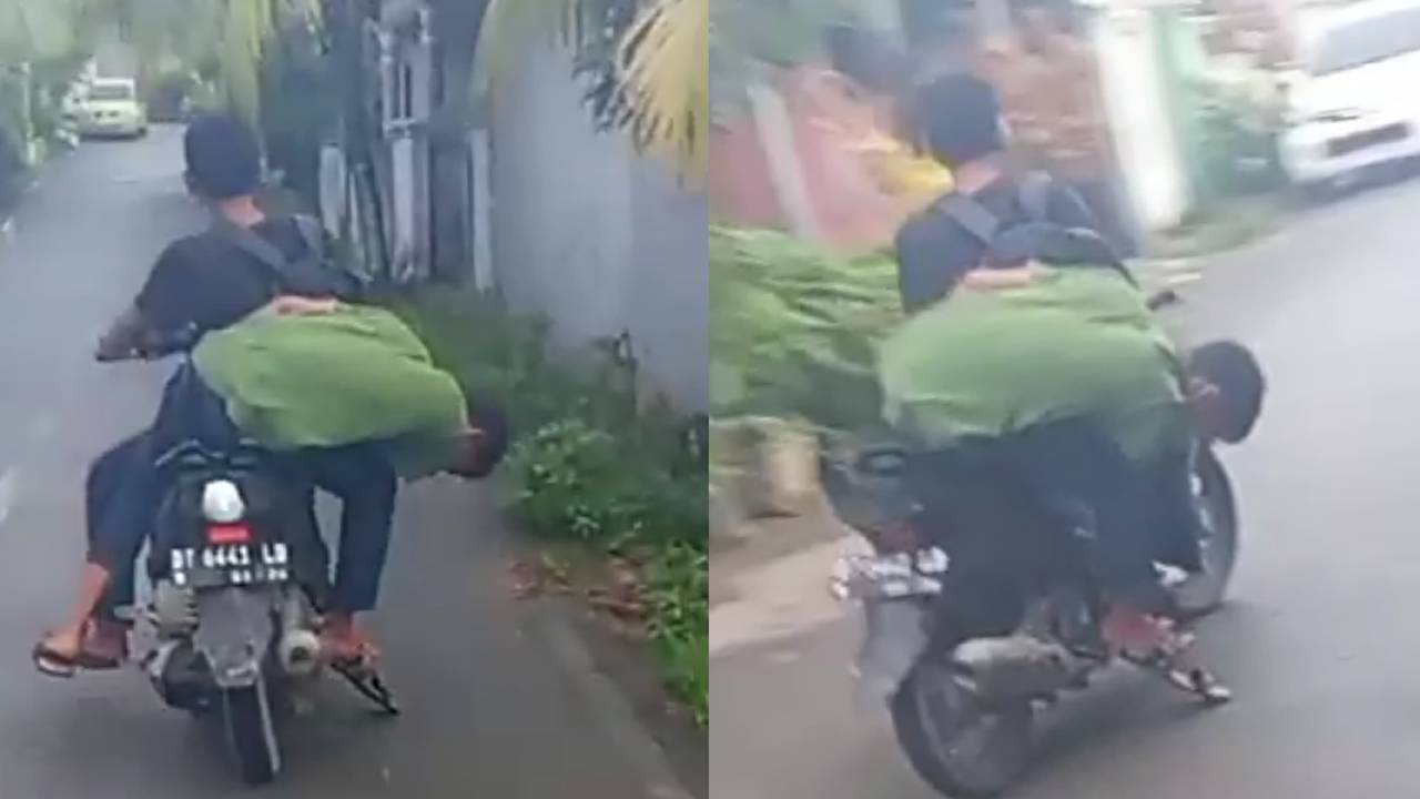 Pria mabuk yang dibonceng nyaris jatuh dari motor dan menjadi viral. Foto: Screenshoot Video