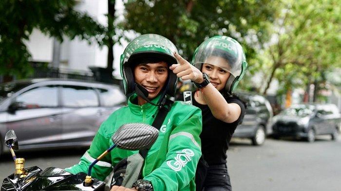 Grab dikabarkan akan mengakuisisi GoTo dengan nilai Rp 115,8 triliun. Foto: Repro Tribunnews