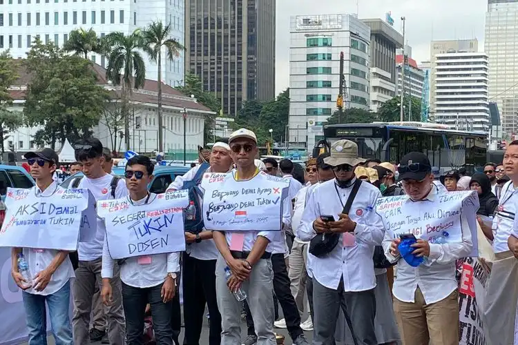Pemerintah menargetkan tunjangan kinerja dosen ASN cair Juli-Agustus 2025 mendatang. Foto: Repro Kompas