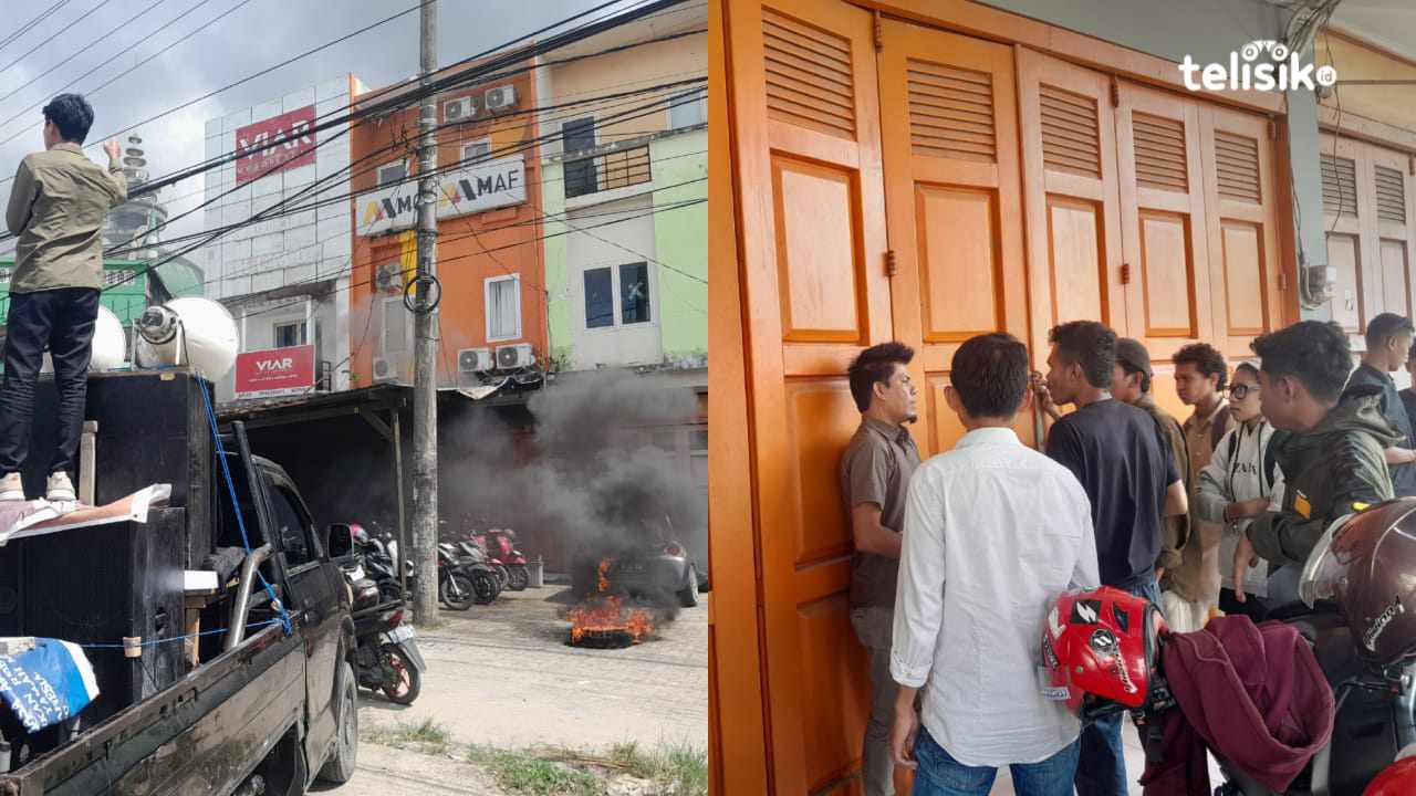 Massa melakukan demo dan menyegel pintu masuk kantor PT MCF-MAF di Jalan Ahmad Yani, Kelurahan Mataiwoi, Kecamatan Wuawua, Kota Kendari, Selasa (6/5/2025). Foto: R. Anugrah/Telisik